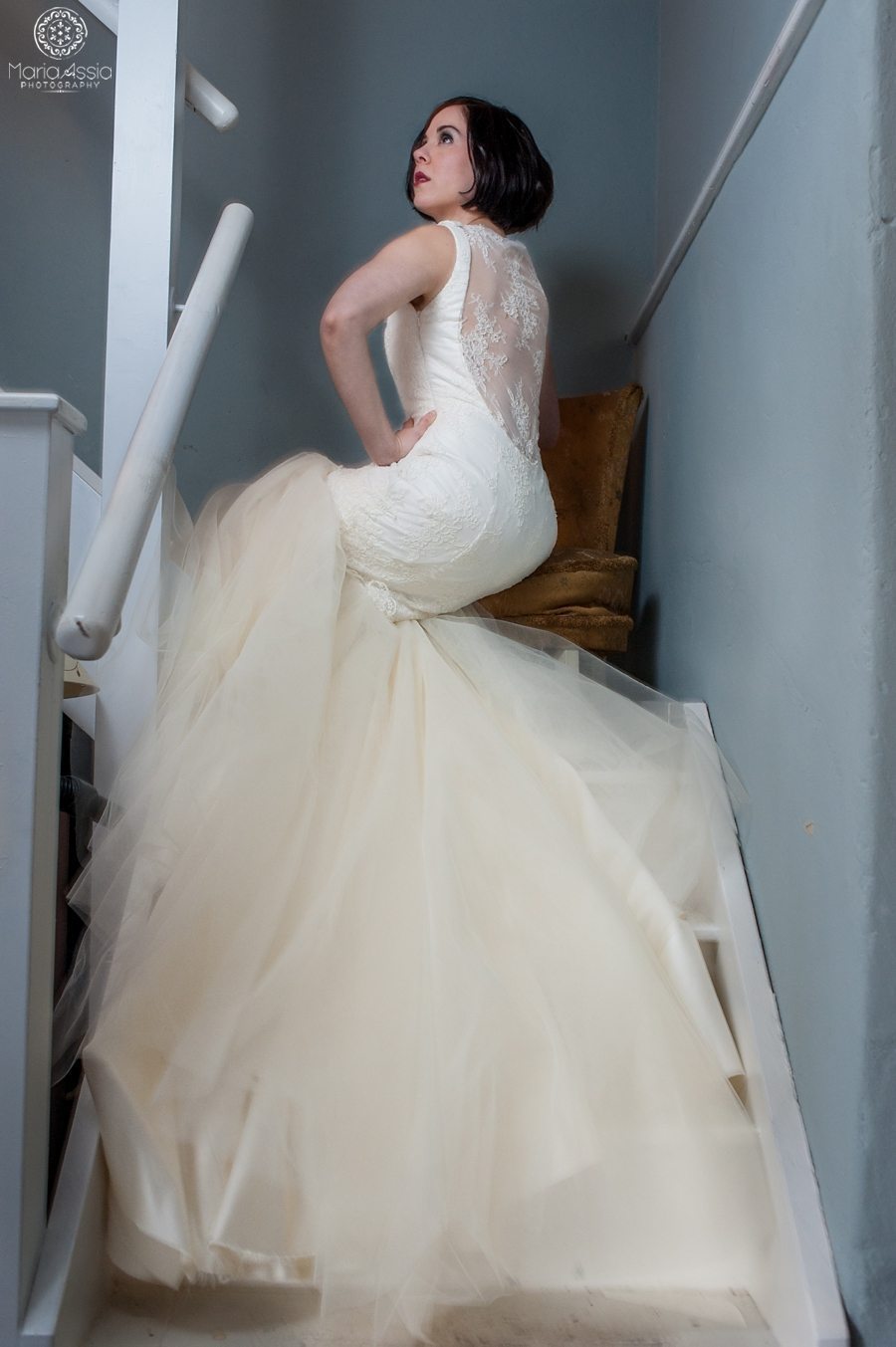 Bride looking up the stairs