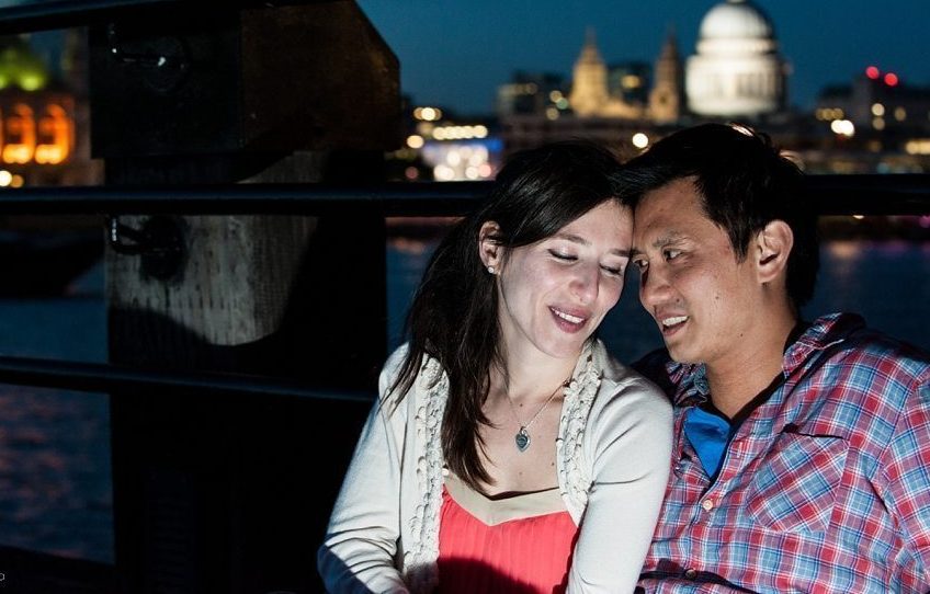 Couple hug on their Southbank pre-wedding shoot