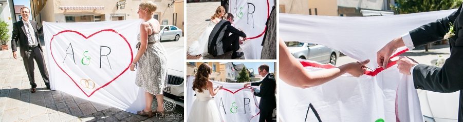 Bride and Groom play a German traditional wedding game and cut out a heart from a sheet