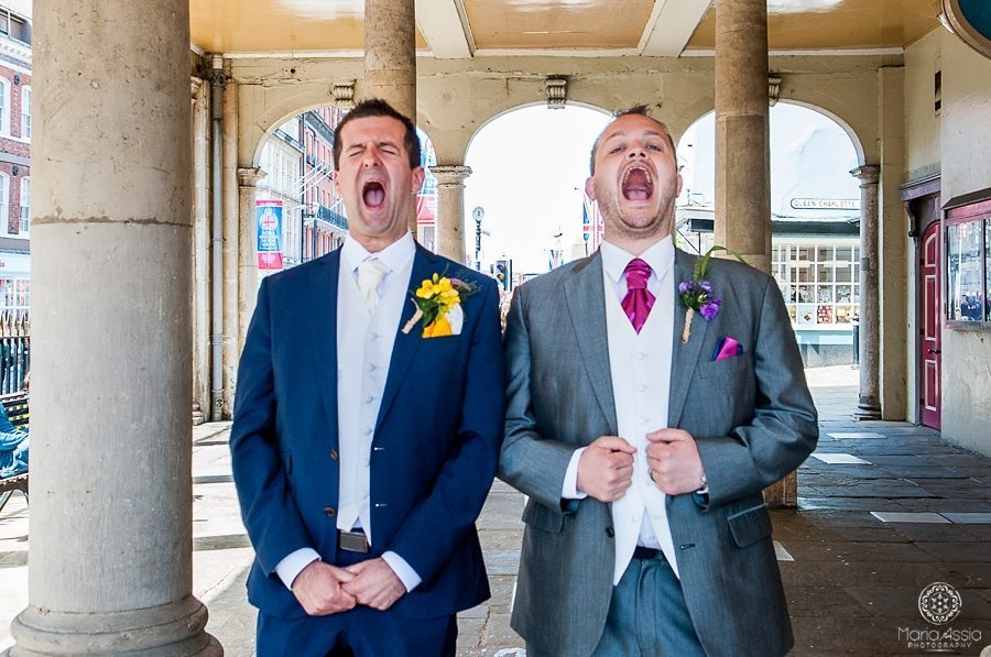 Groom and best man having fun at Sir Christopher Wren Hotel Vintage Windsor Wedding