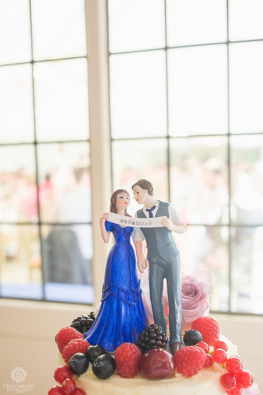 Cake topper at a Birtsmorton Court Navy Blue Wedding - Maria Assia Photography