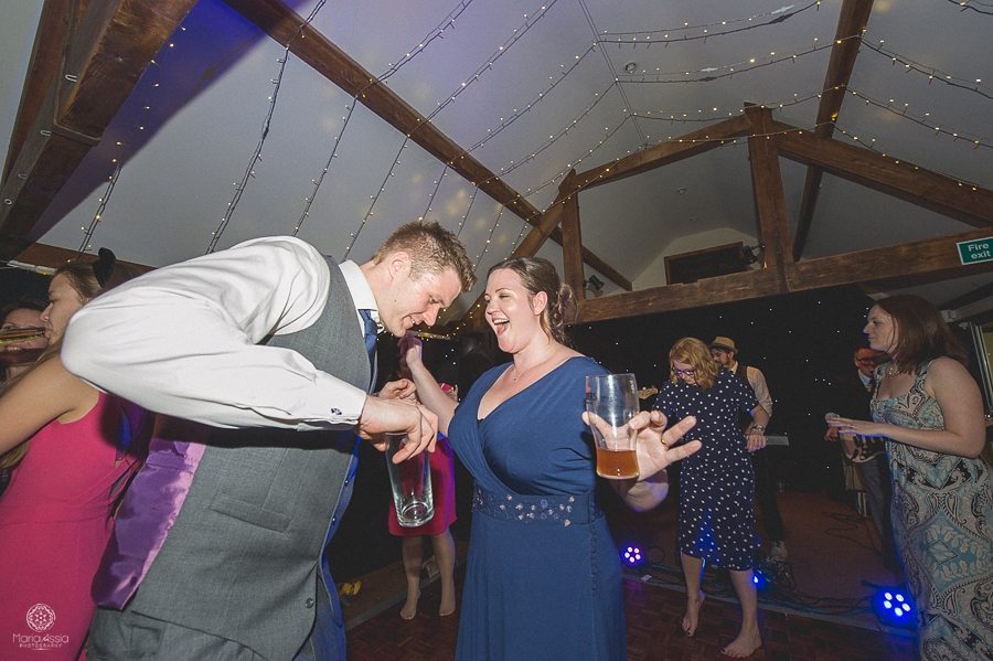 bride and groom dancing at their Birtsmorton Court Navy Blue Wedding - Maria Assia Photography