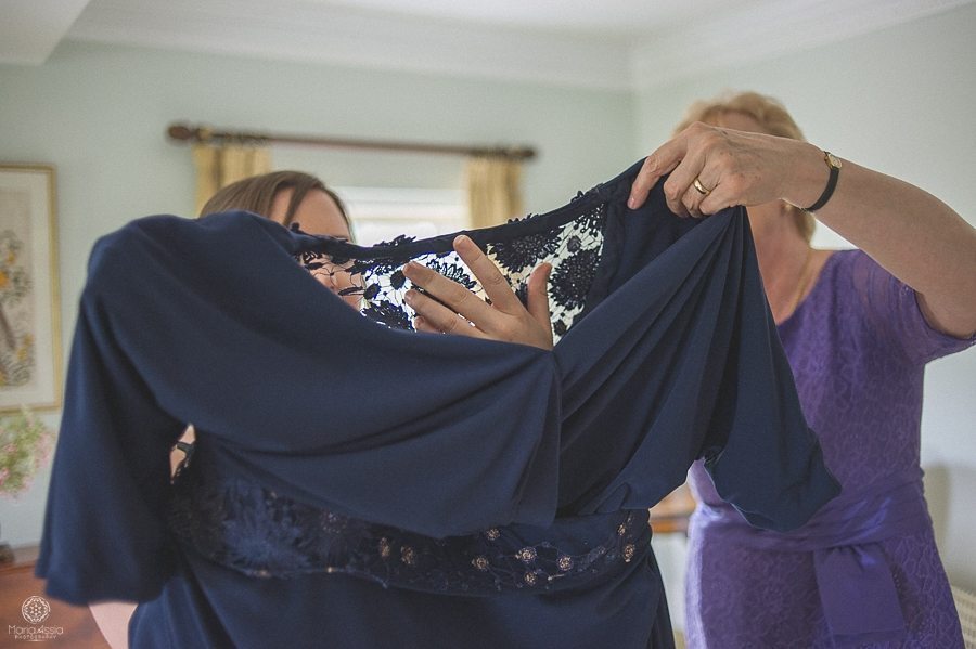 Bride getting ready for her Birtsmorton Court Navy Blue Wedding - Maria Assia Photography