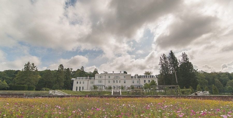 Coworth Park Mansion and wildflower meadow