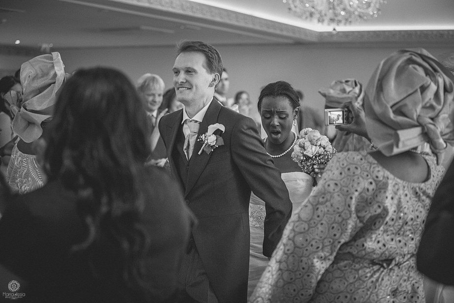 Bride and groom's Traditional Nigerian Colourful Ethnic Wedding dance at Froyle Park