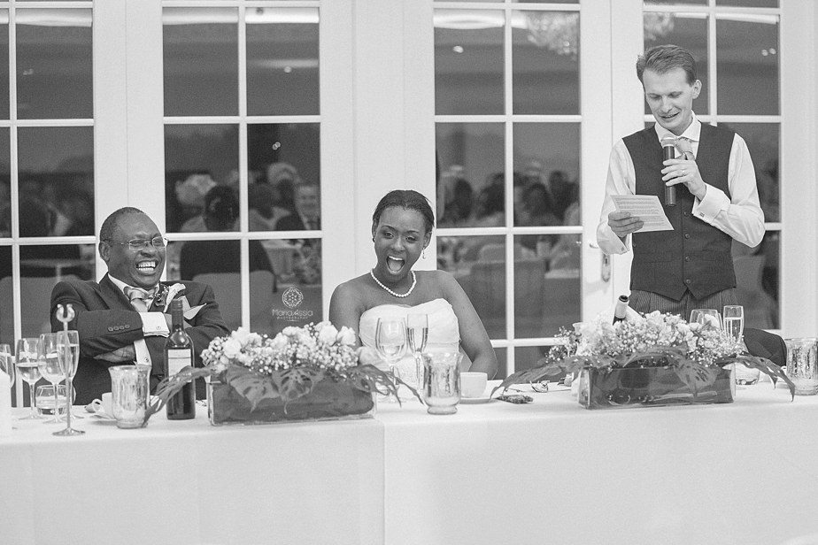 Bride's reaction to Groom's speech at their Froyle Park wedding