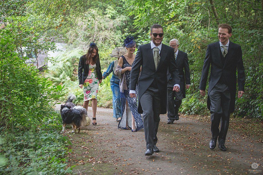 Groom and his best man walking to the church