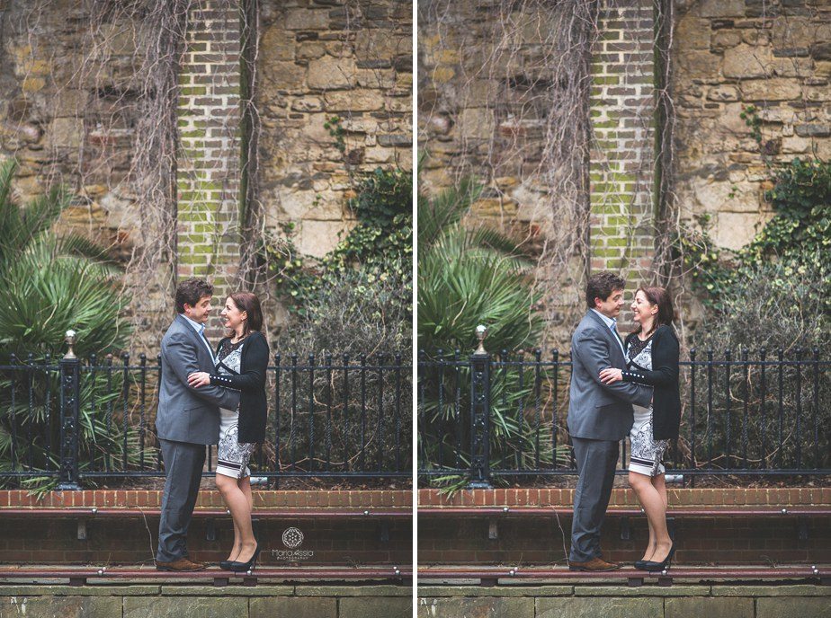 A couple laughing in a square on their Hastings pre wedding shoot