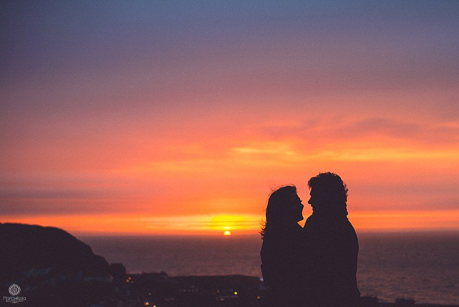 A silhouette of a couple on their engagement photo shoot in Hastings