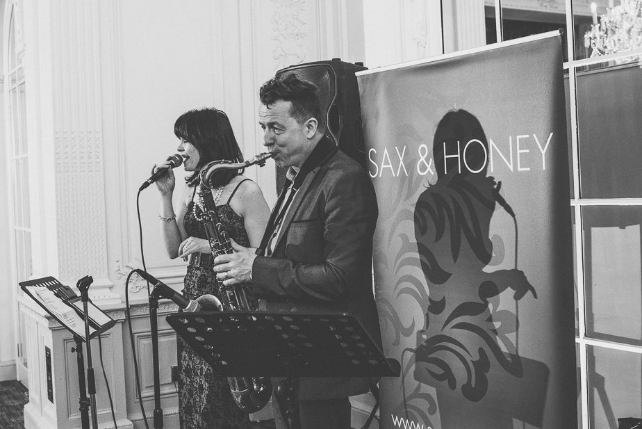 Sax and Honey wedding band playing at Warren House