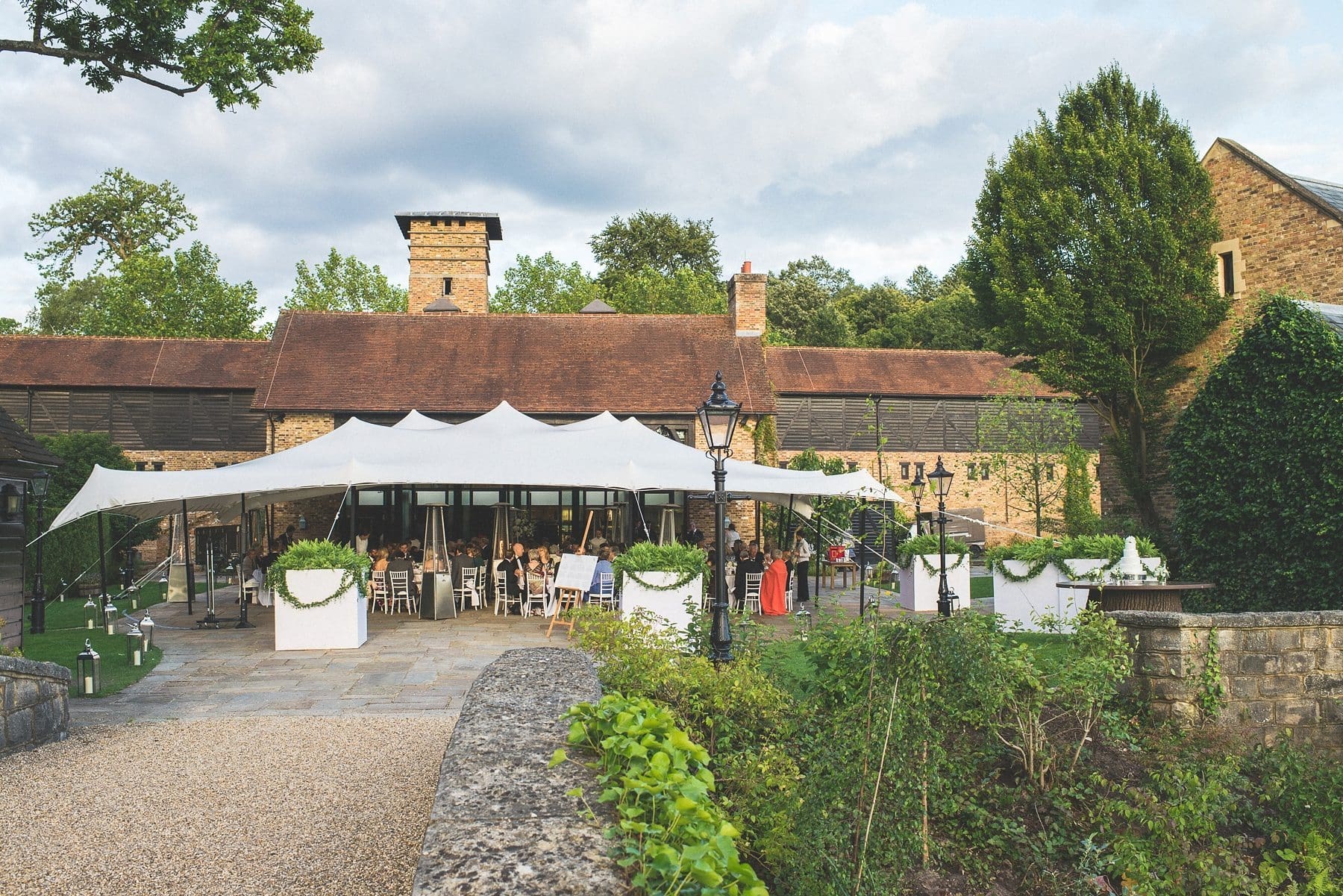 Coworth Park barn summer wedding photography