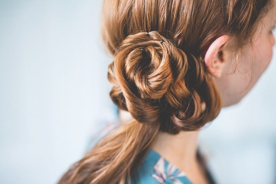 Red haired Bride's messy side bun at The Old Rectory Country House