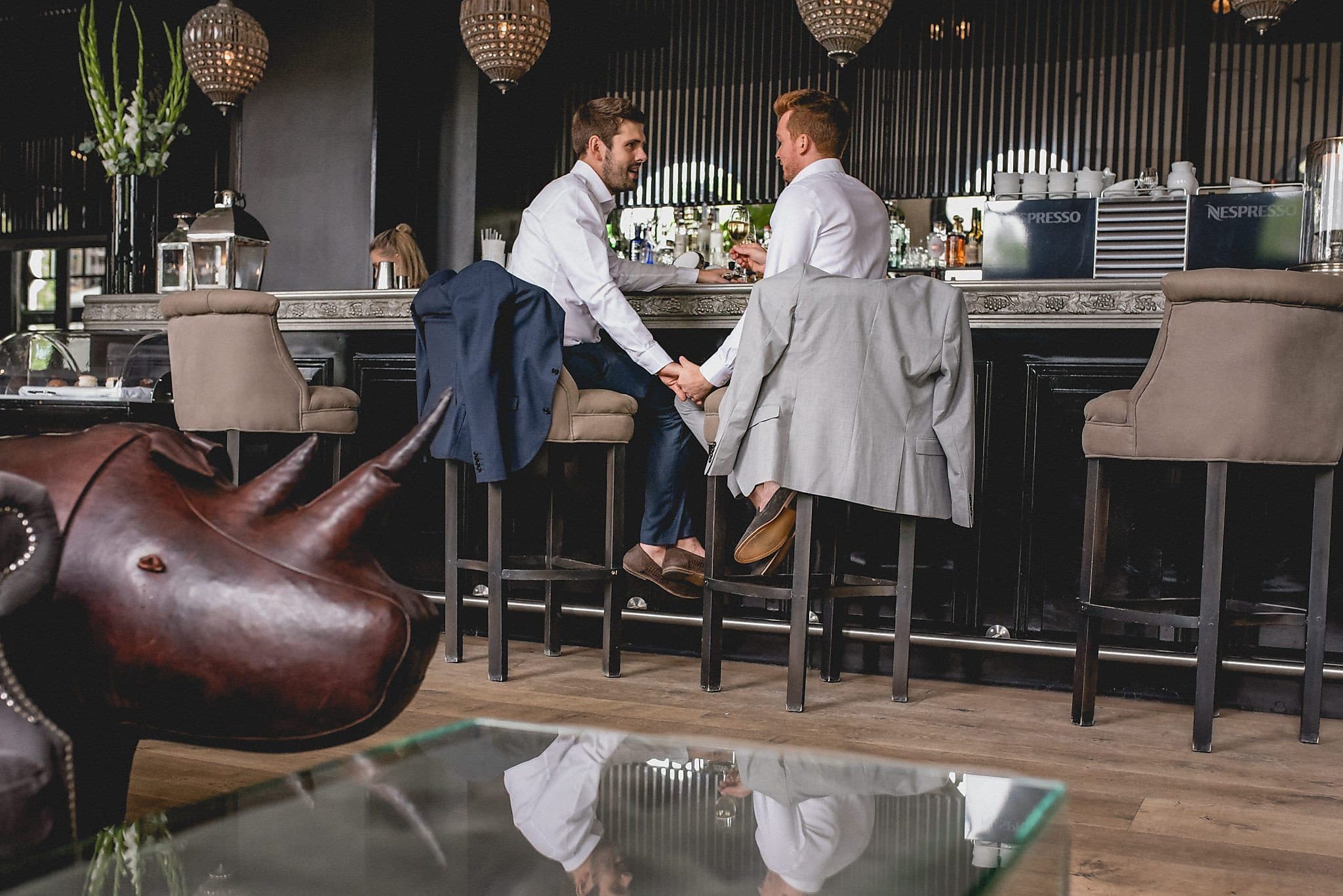 Two grooms celebrate at a stylish Copenhagen Restaurant