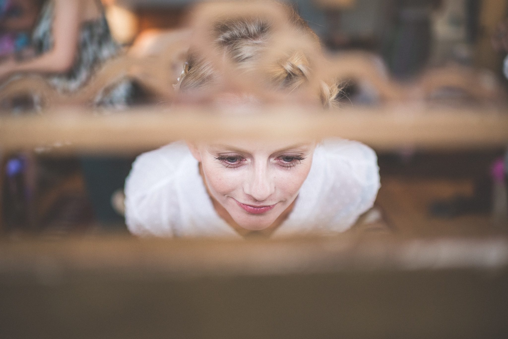 Smedmore House Bride looks at herself in the mirror