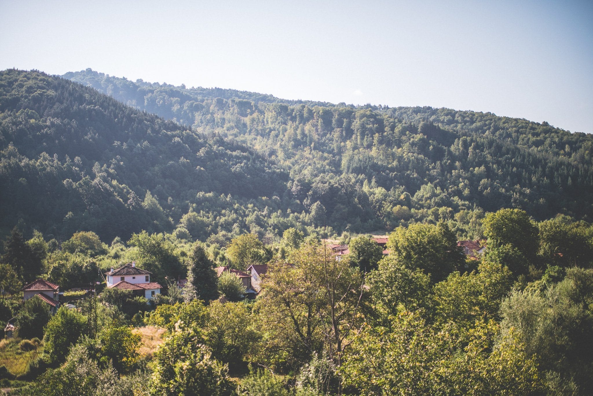 The view out over the forested peaks of the Balkan mountains