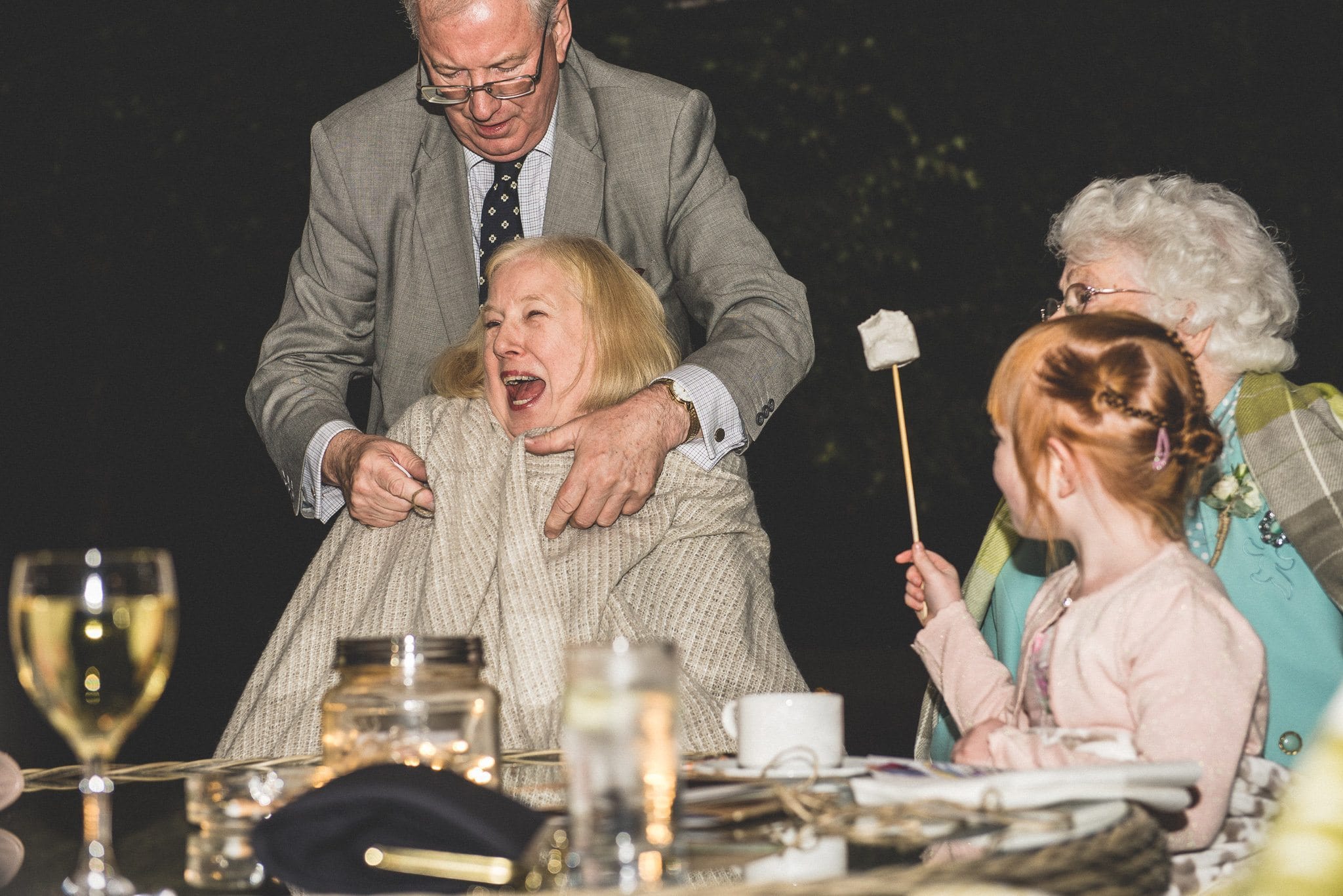 Wedding guests laughing at this fun Gate Street Barn Wedding