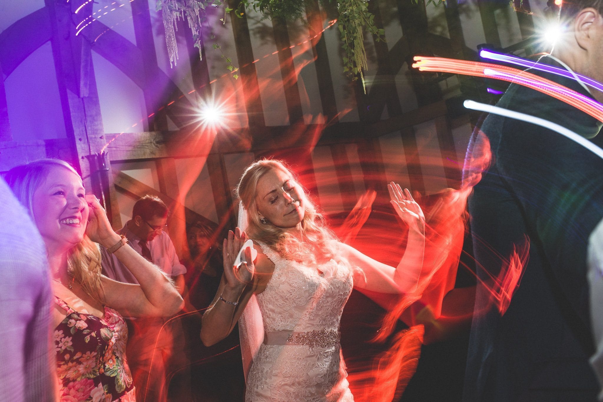 Bride dancing at her Super Fun Gate Street Barn Wedding