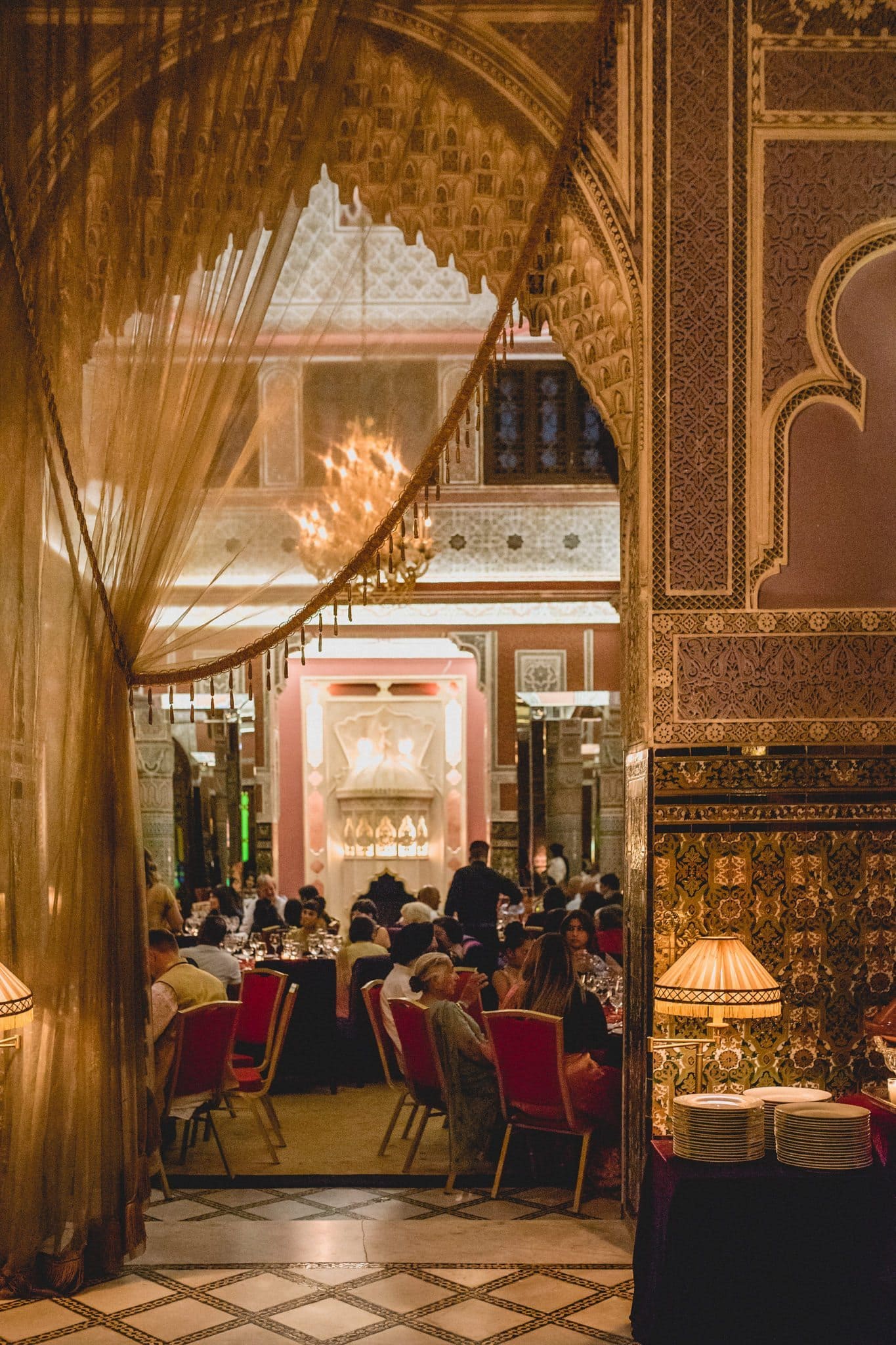 Indian wedding guests enjoying their wedding meal at Palais Soleiman in Marrakech