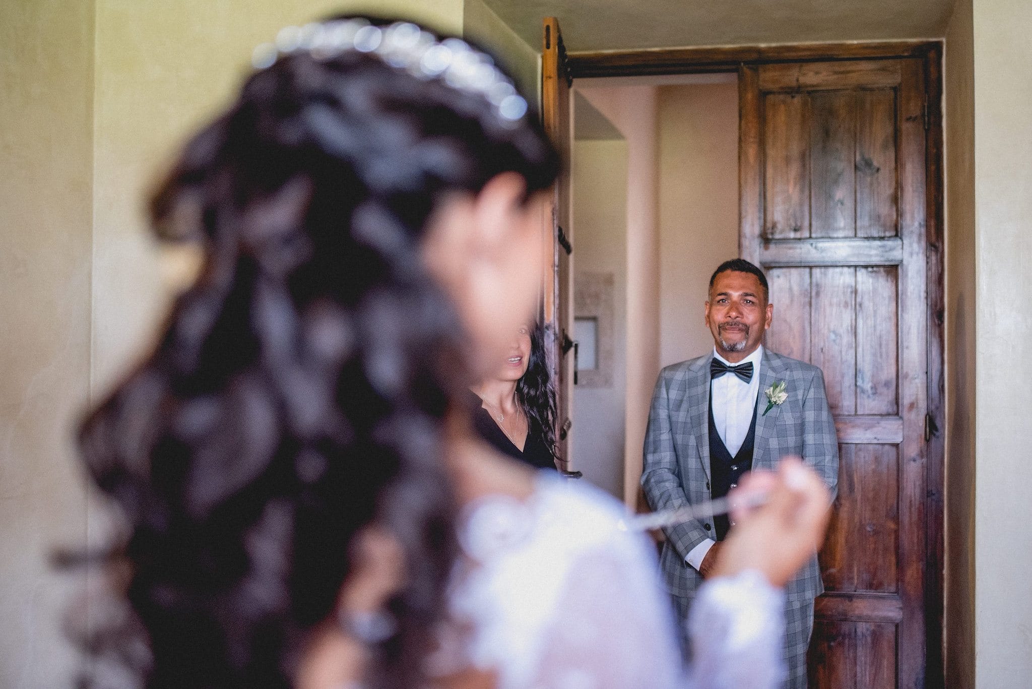 Aaysha's father wells up as he sees his daughter in her dress.