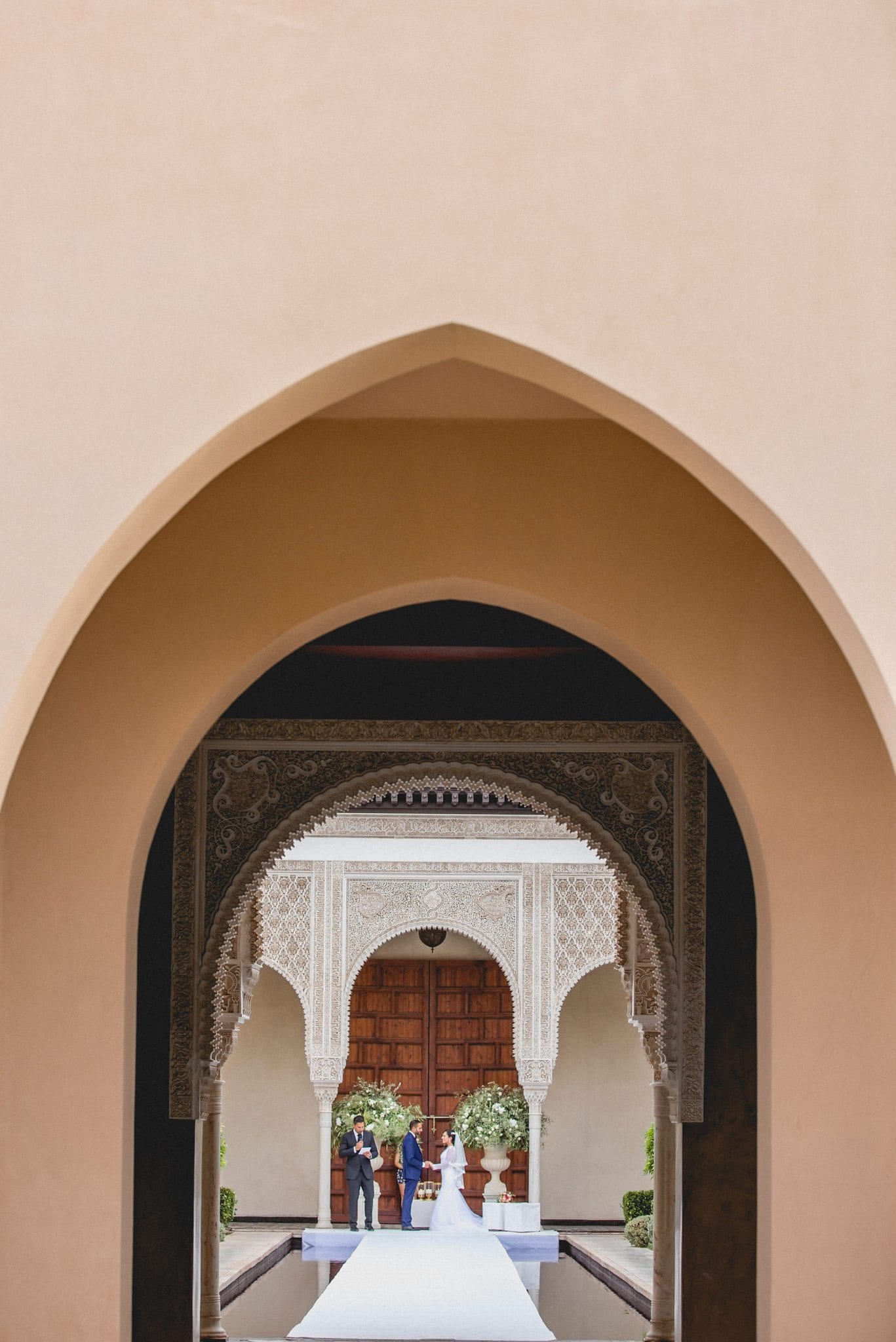 Bride and Groom getting married at their Ksar Char Bagh Luxury Marrakech Destination Wedding 