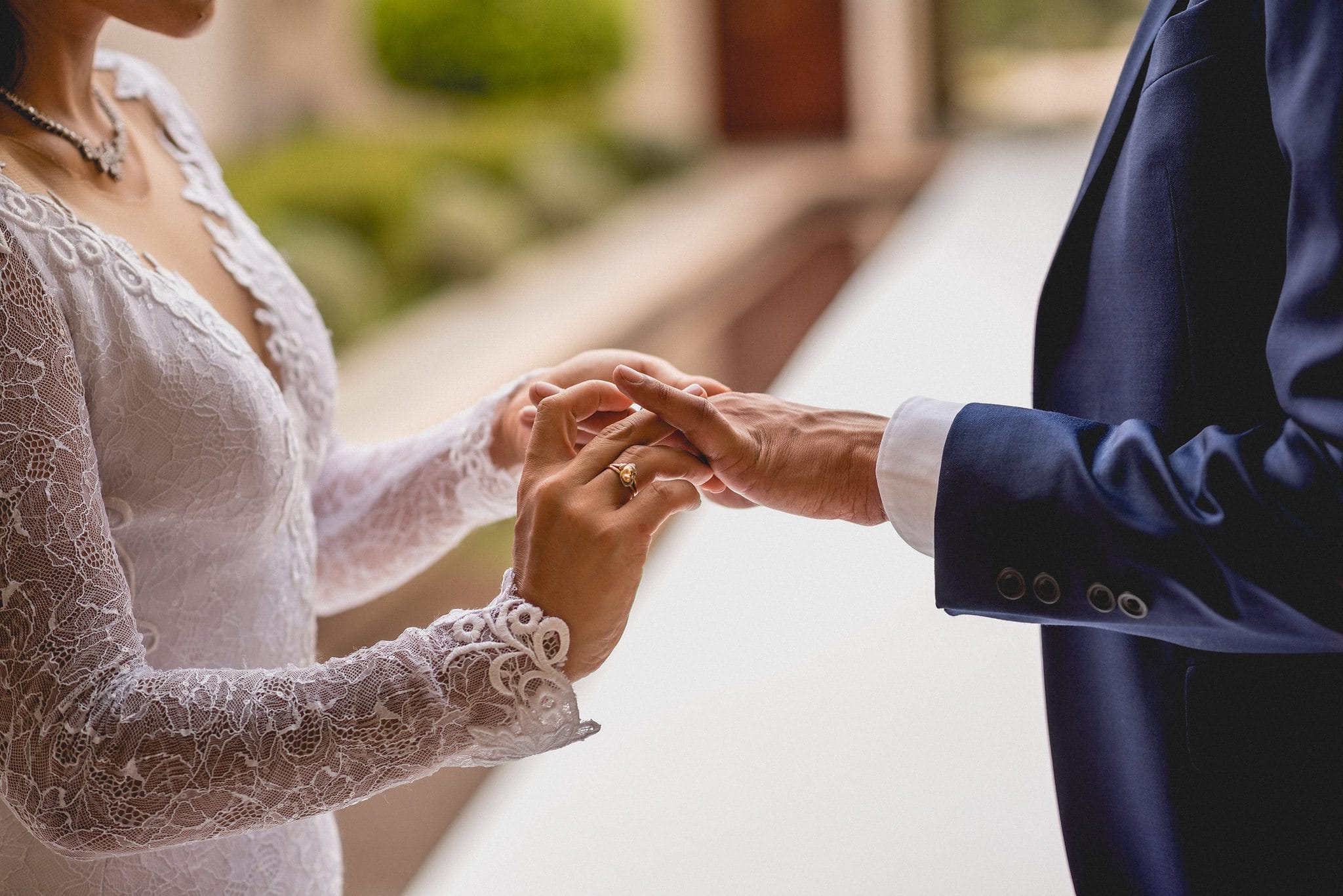 Bride and Groom exchange rings at their Ksar Char Bagh luxury Marrakech Destination Wedding