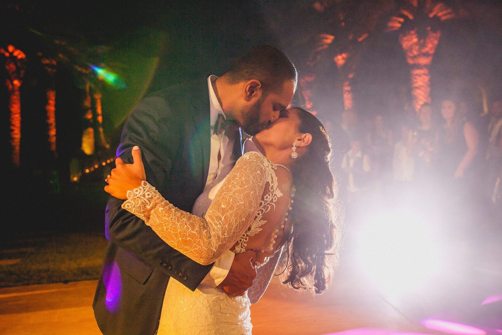 Bride and groom kiss on the dancefloor at Ksar Char Bagh