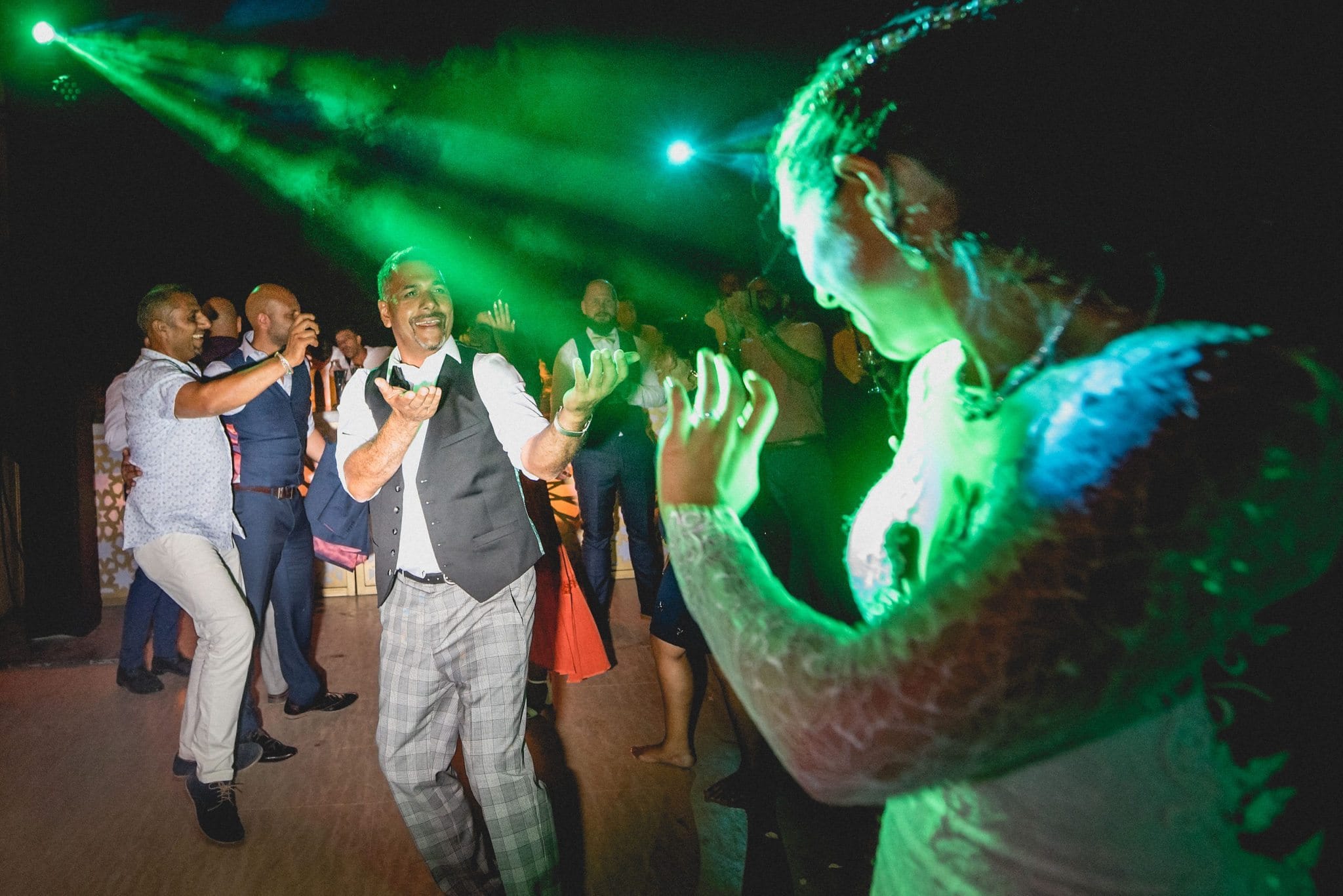Bride and her dad dancing happily at Ksar Char Bagh