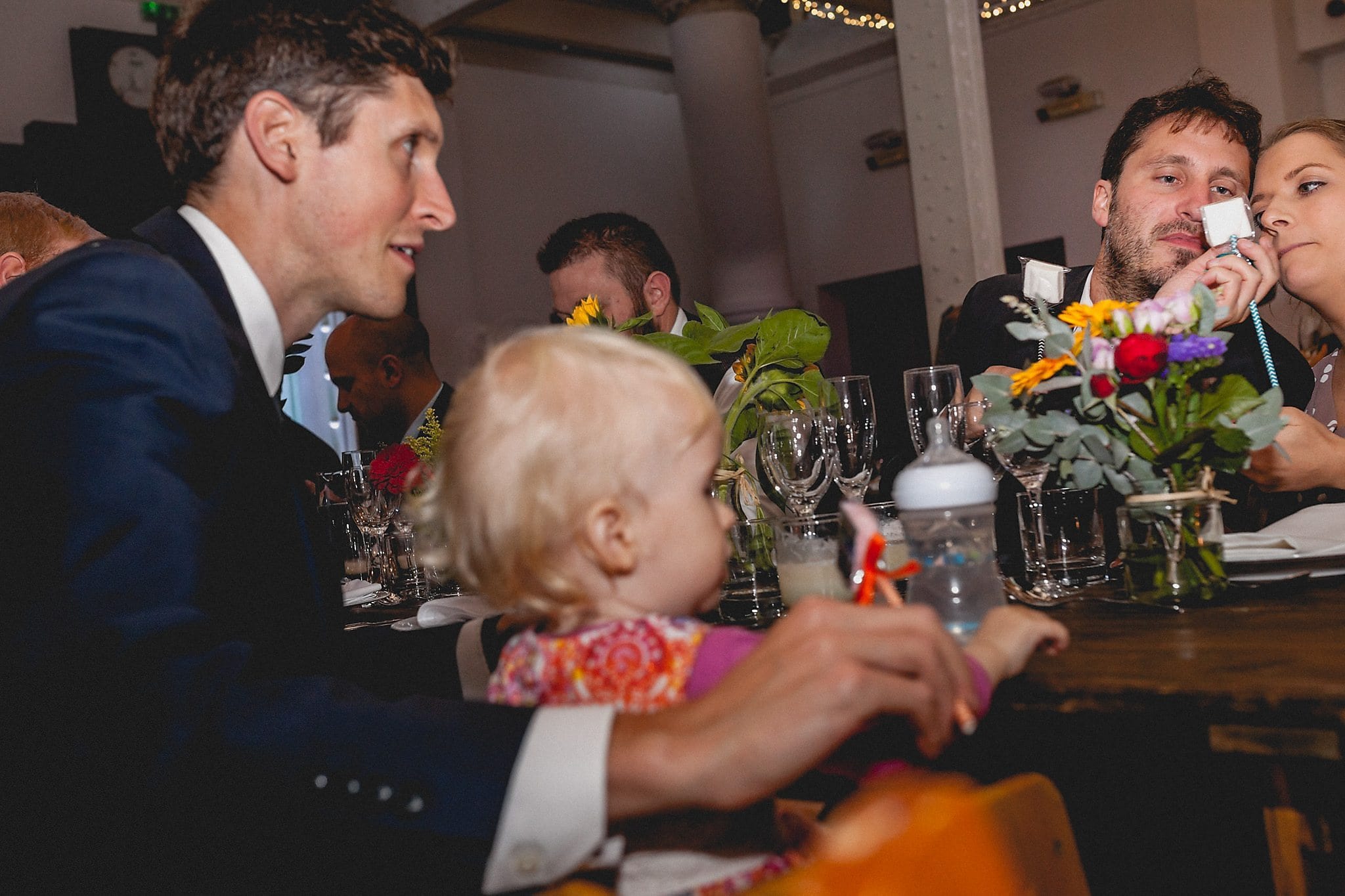 Wedding guests looking at the place settings at a West Reservoir Centre Wedding