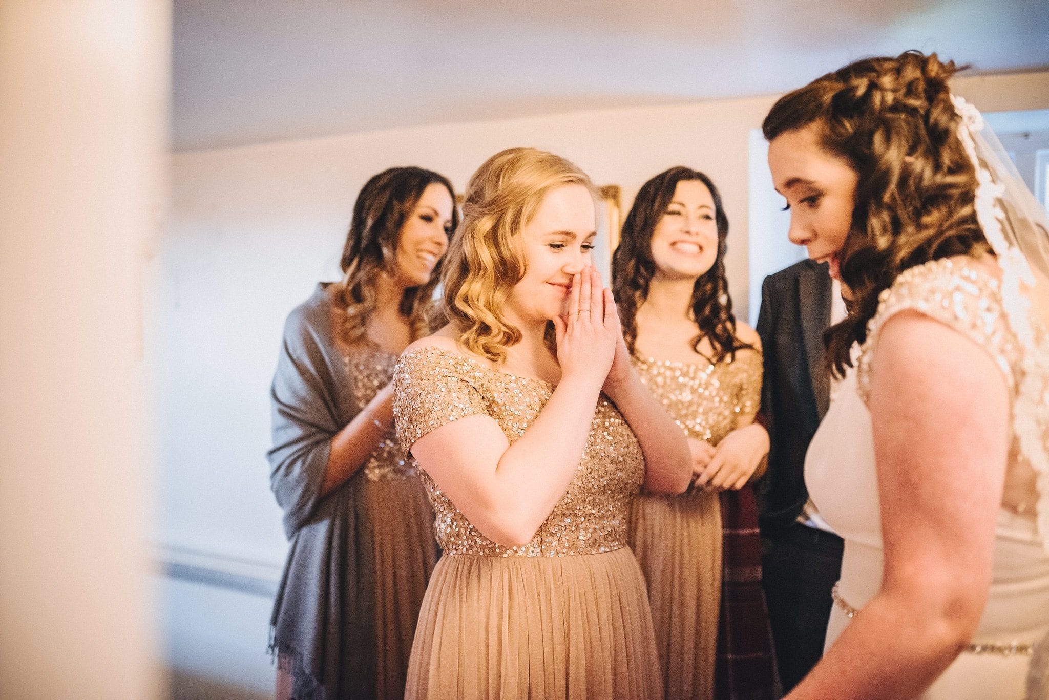 Bridesmaid gets emotional seeing bride in her dress for the first time