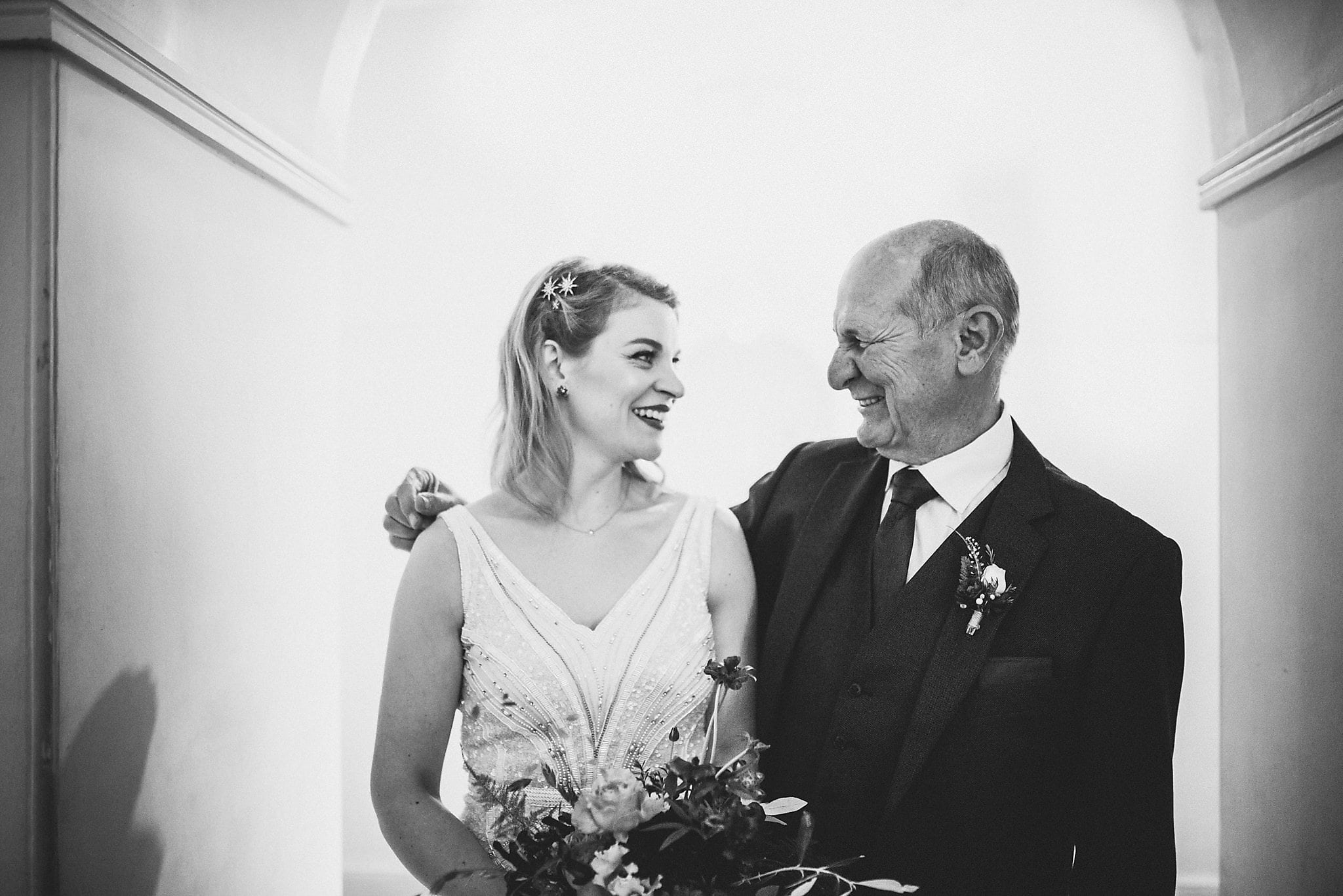 Bride and Father of the bride sharing a smile at her Clissold House Wedding