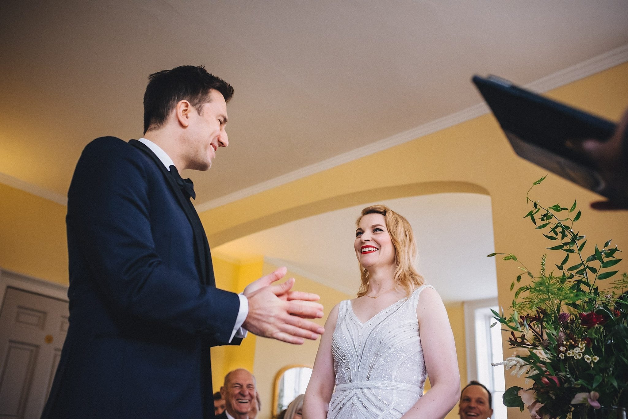 Couple exchanging wedding vows at their Clissold House wedding ceremony