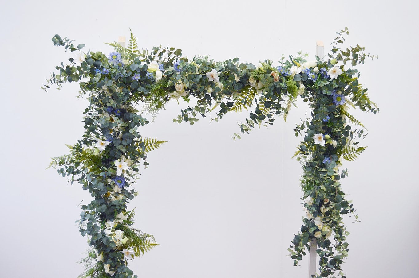 Artificial floral arch by Friend of Faux