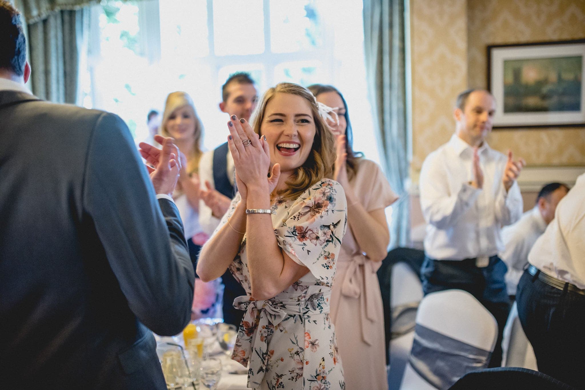 Guests applaud during wedding speeches at Shendish Manor