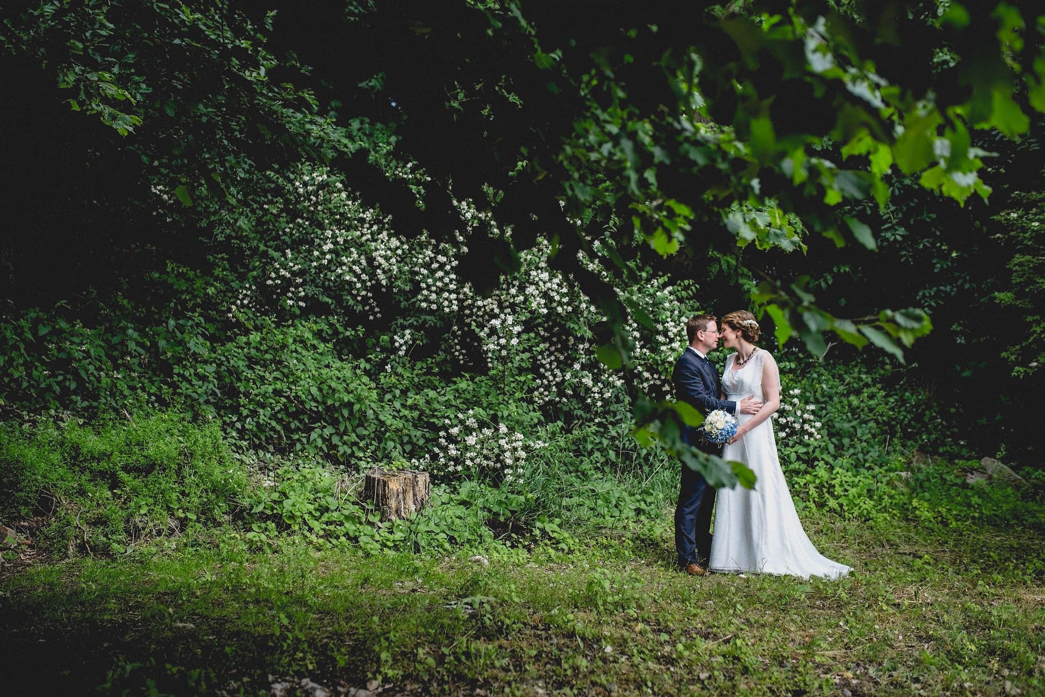 Bride and groom snuggling at their German destination wedding