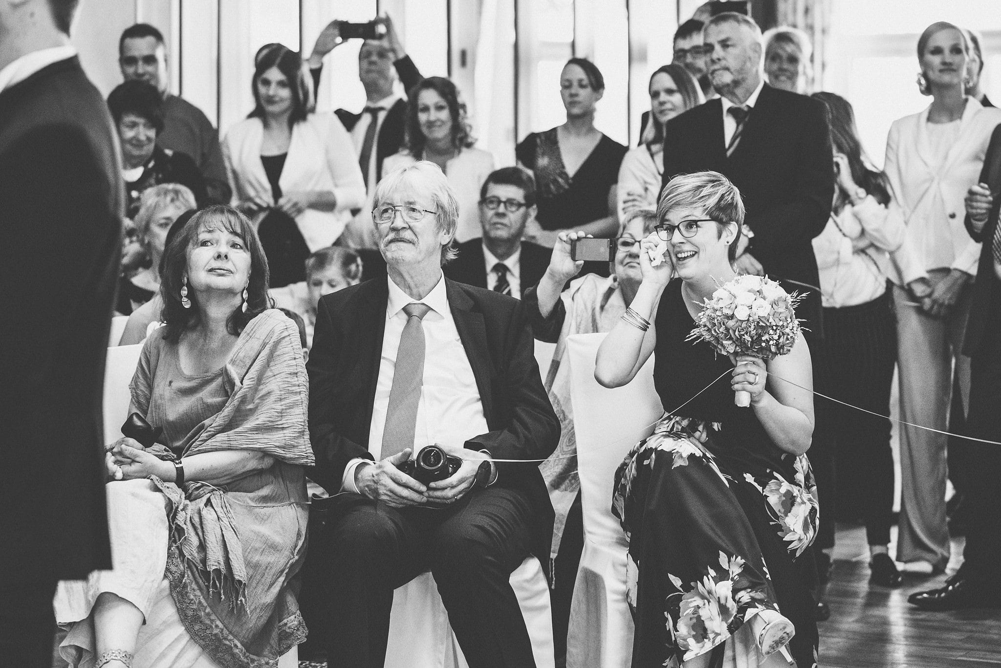 Wedding guests tearing up at a Heartfelt Destination Wedding in Germany