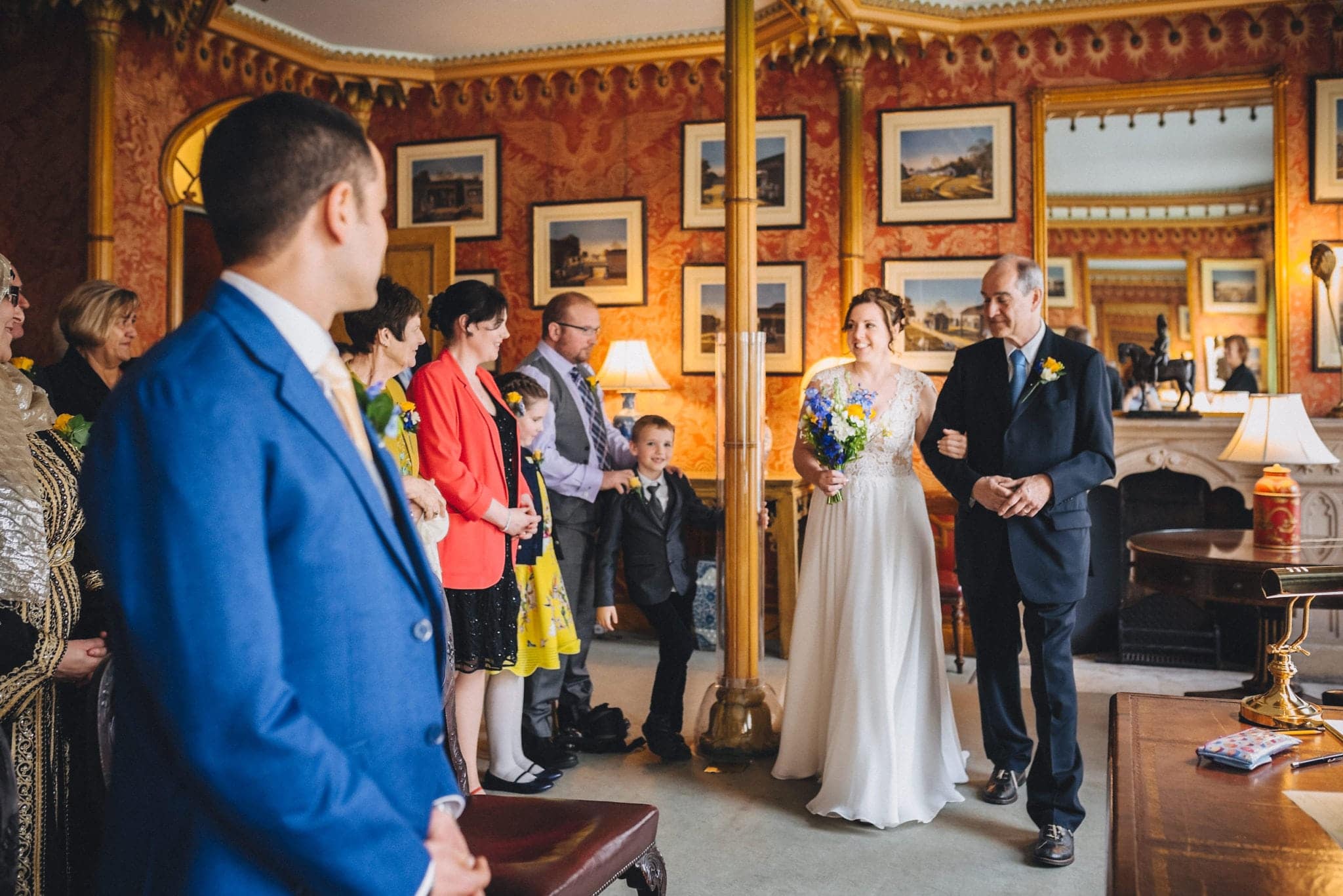 Bride walks in to her wedding ceremony at Brighton royal pavilion