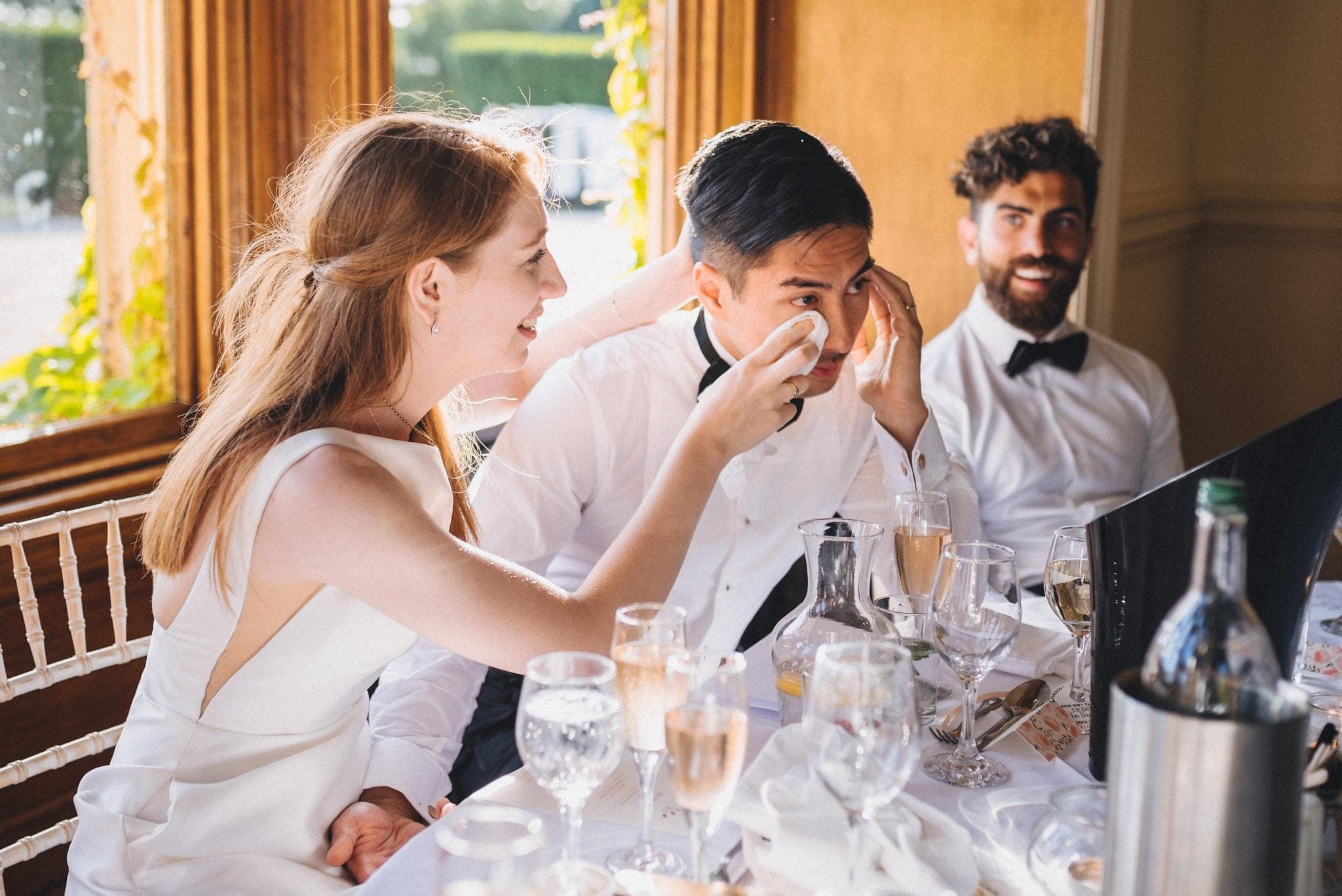 Bride wipes groom's eyes during emotional wedding speeches