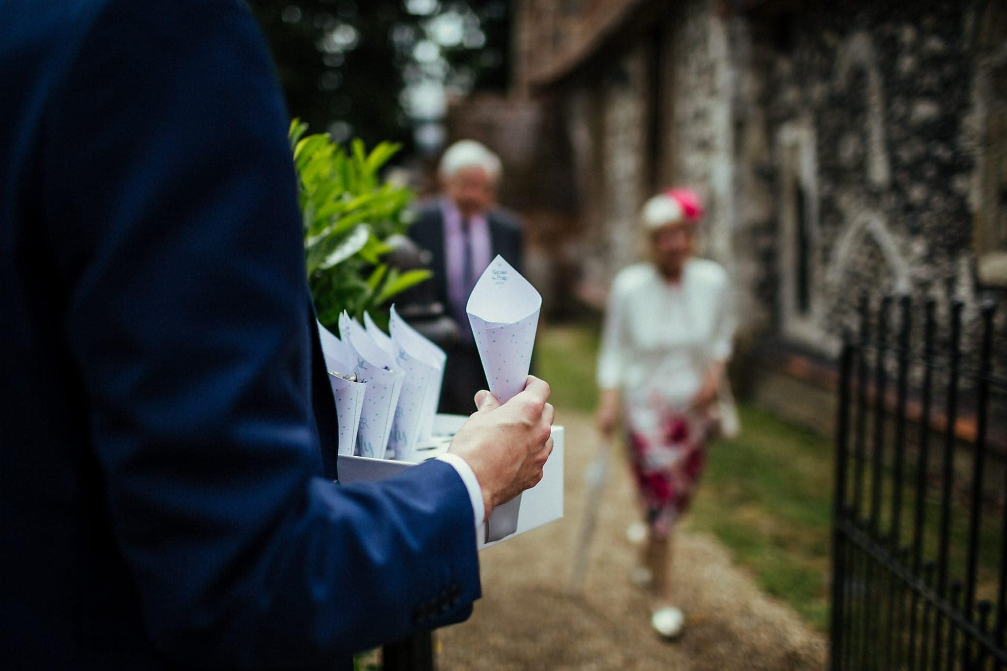 Usher holding confetti cones at Dorney Court Church