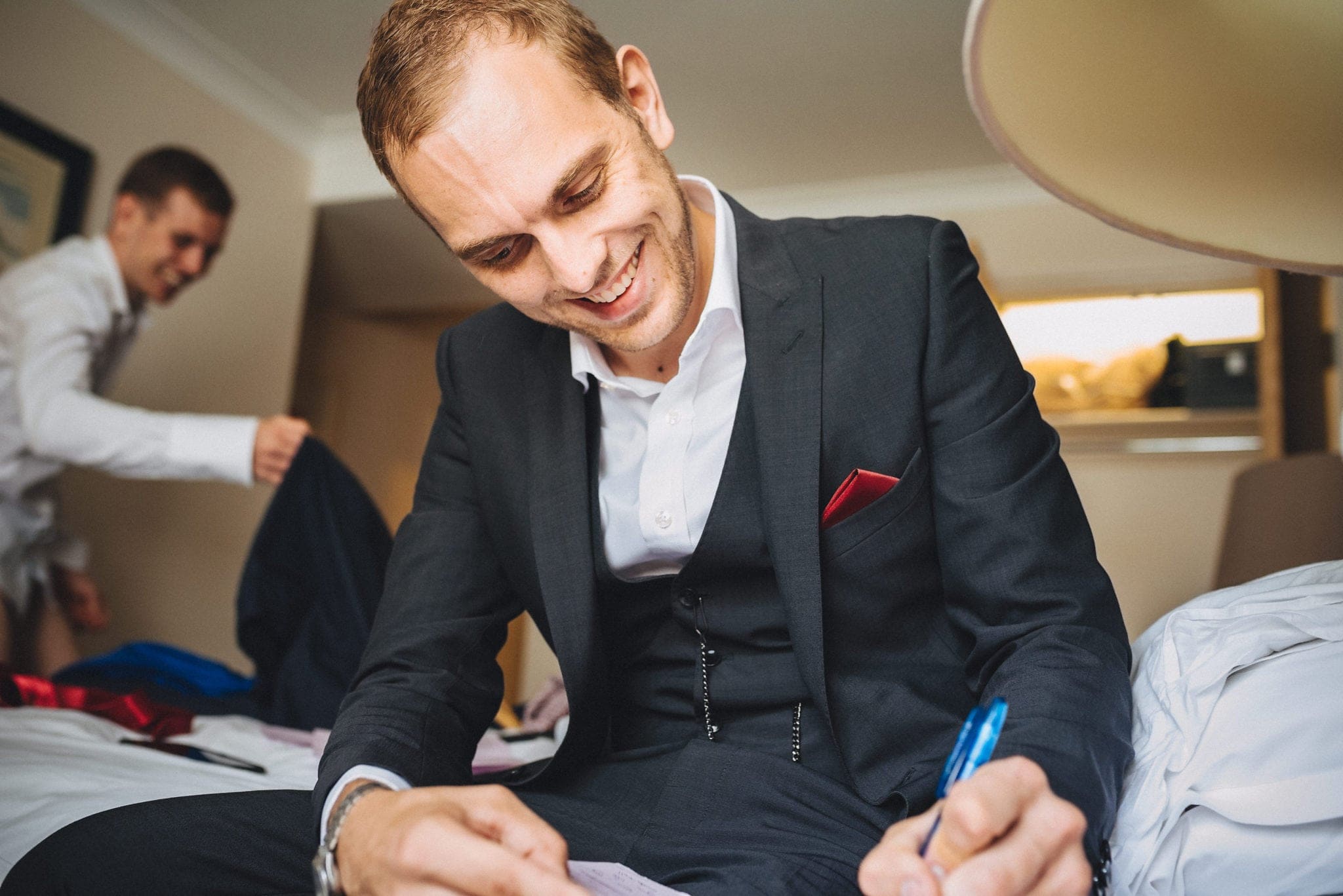 Groom writes speech in Hever Hotel room