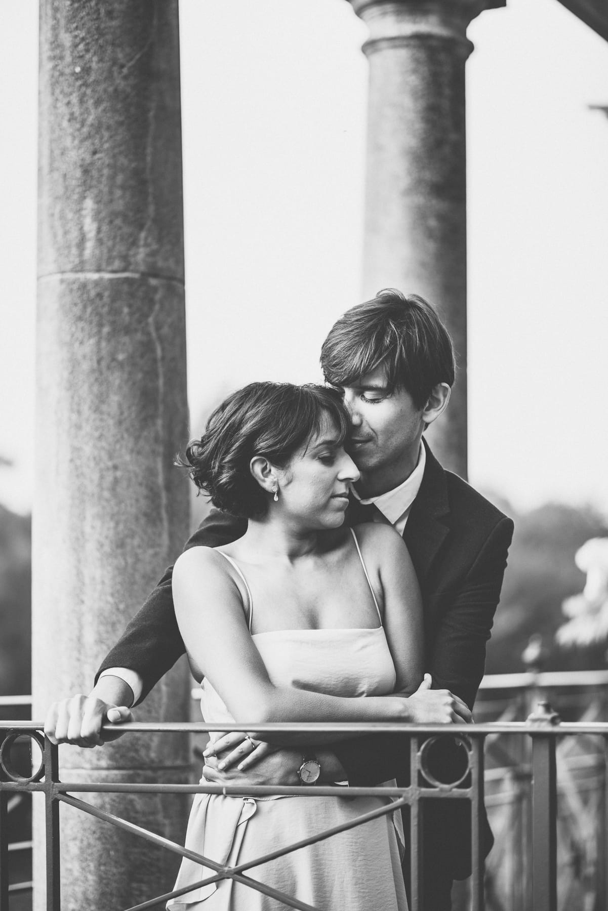 Intimate moment as the groom kisses the bride's forehead