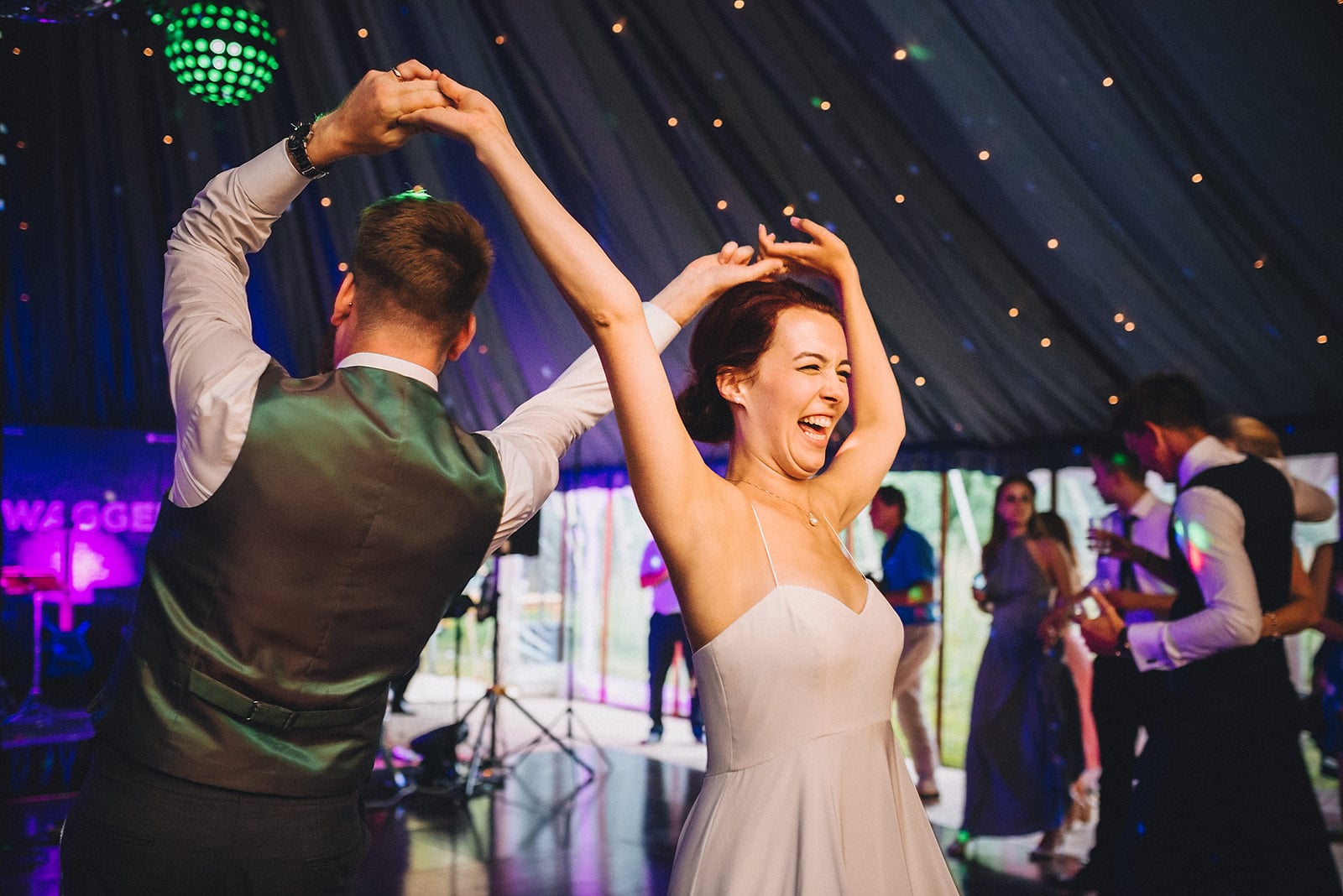 Dinosaurs, Laughter & an epic party for a Joyful Cambridge Farm Marquee Wedding