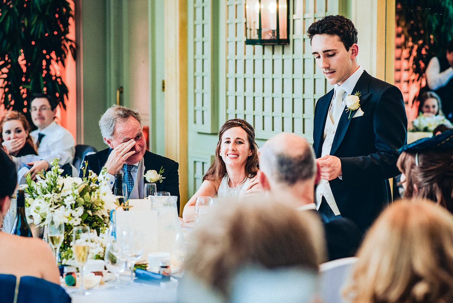 Father of the bride wipes a tear at the groom's speech in the Hurlingham Club Terrace room