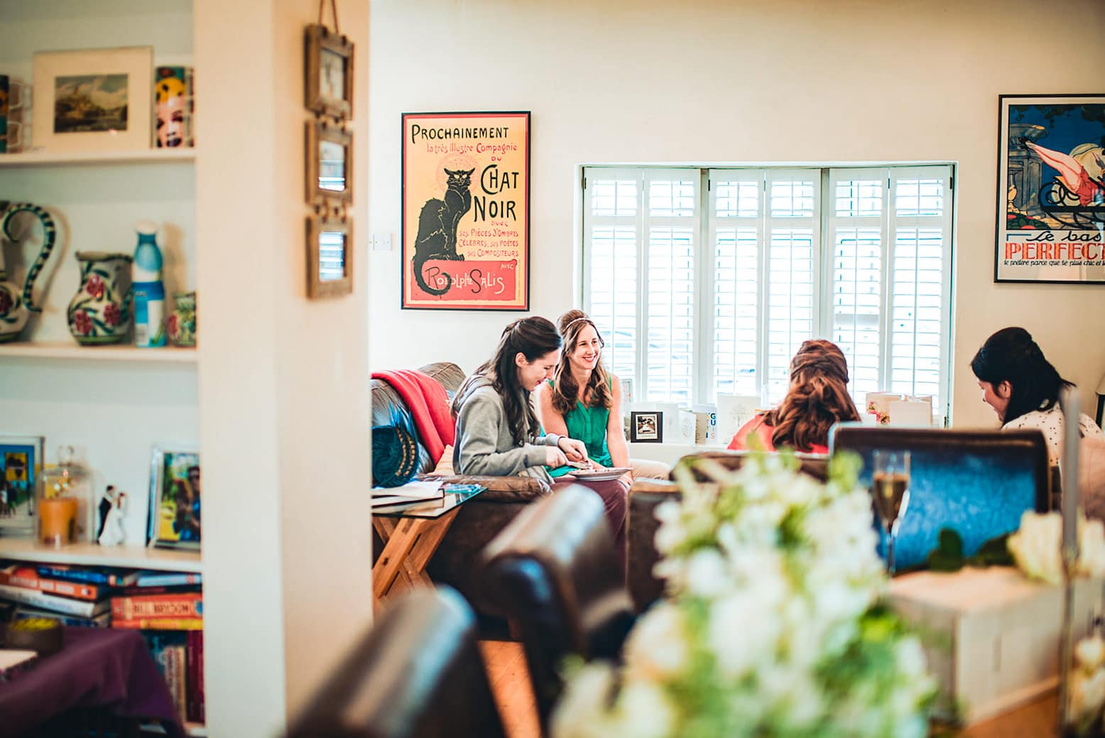 Bride chatting and having breakfast with her bridesmaids