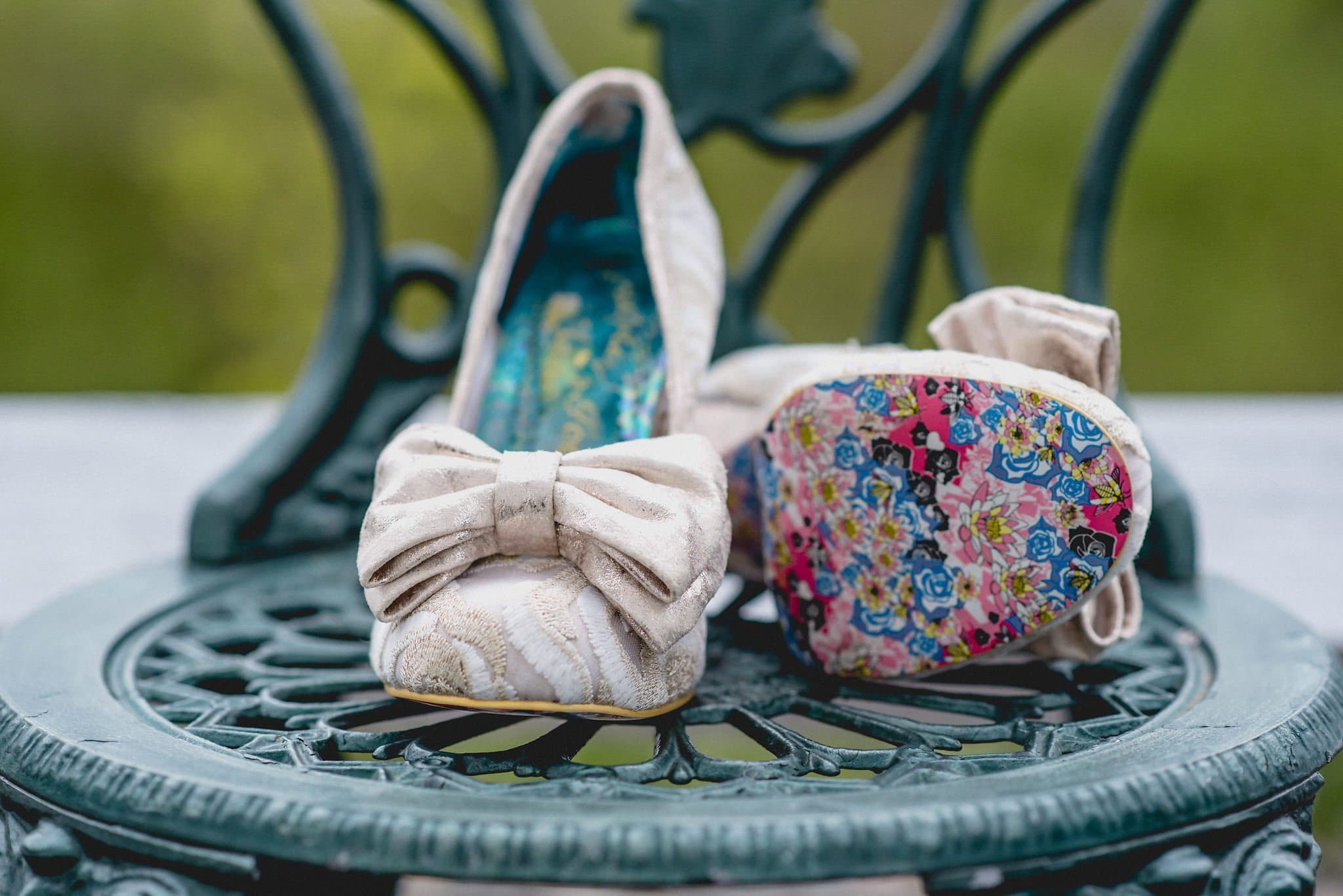 Velvet Irregular Choice shoes with a bow and painted floral soles